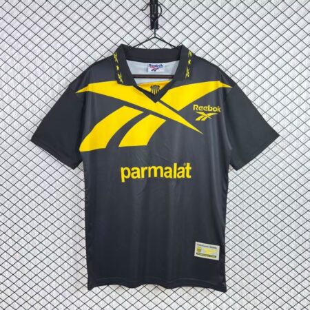 Camiseta visitante retro negra de Peñarol 1998/99 con detalles amarillos, vista frontal